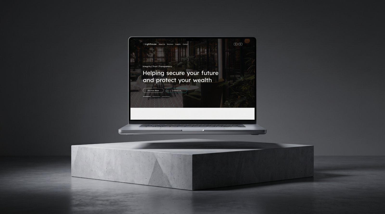 The Lighthouse homepage on a laptop floating above a concrete plinth, showing the Integrity | Trust | Transparency eyebrow and the "Helping secure your future and protect your wealth" headline.